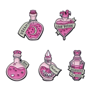 Pink cartoon magic potion enamel pins set featuring dream and love potion designs
