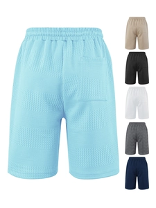 Detail of waffle knit men's shorts showing texture and various color options available