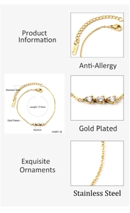 Detail view of gold-plated stainless steel bracelet with three pear-shaped zircon stones