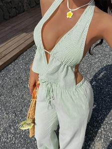 Women's summer green striped two-piece set featuring a halter V-neck top and casual trousers