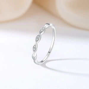 Minimalist S925 sterling silver wave ring featuring sparkling cubic zirconia stones