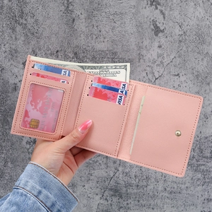 Pink cute cartoon short trifold wallet for women featuring multiple card slots and coin pocket
