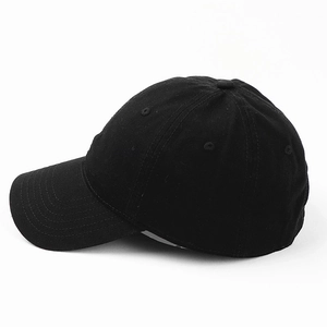 Classic black cotton baseball cap with a six-panel structure and curved brim on white background