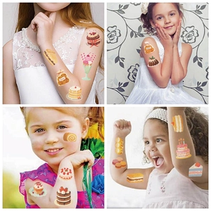 Detail of colorful dessert tattoos on children arms and cheeks for party gifts