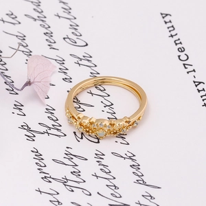 Detail of vintage S925 silver ring with 14K gold plating, opal stone and tiny zircons