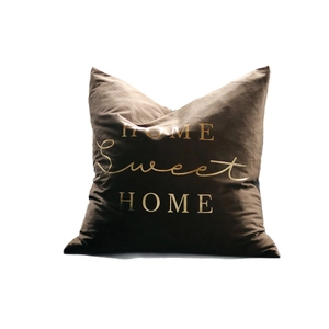 Brown velvet cushion cover with gold foil Sweet Home lettering in minimalist Nordic style