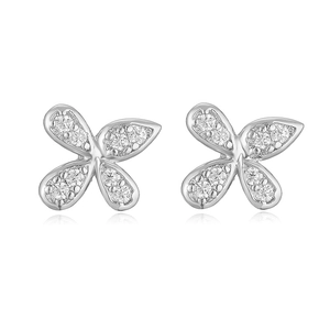 Detail of silver bow earrings with sparkling micro-set cubic zirconia crystals
