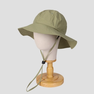 Breathable quick-dry sun hat in light green with adjustable chin strap for outdoors