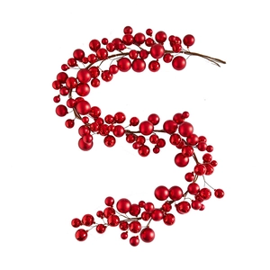 Red Christmas ball garland with matte mirror and faceted textures for tree decoration