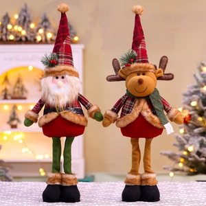 Detail of Christmas plush gnomes with plaid hats and long legs in a warm festive setting