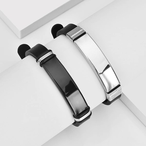 Minimalist silicone and stainless steel bracelets in black and silver finishes