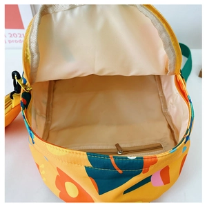 Detail view of children backpack interior showing spacious main compartment and inner pocket