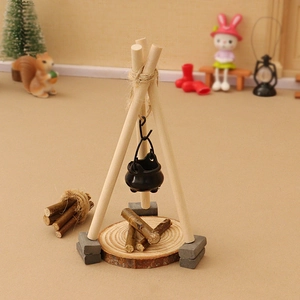 Miniature dollhouse camping tripod with black hanging pot and realistic wood log base
