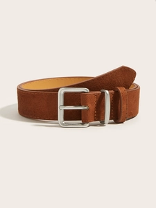 Detailed view of dark brown suede waist belt featuring a matte silver square buckle