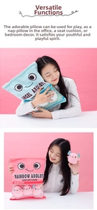 Model holding a pink plush snack bag pillow filled with cute mini axolotl dolls