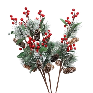 Artificial Christmas pine branch with red berries, natural cones and white faux snow