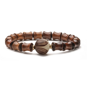 Armband aus natürlichem Ebenholz mit Bambusknotenperlen und geschnitzter Hauptperle