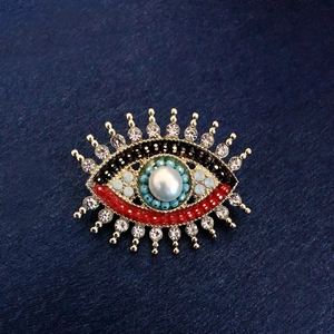 Vintage Evil Eye brooch with freshwater pearl and colorful rhinestones on gold base