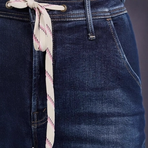 Deep blue wide-leg denim pants featuring pink and white striped drawstring waist detail