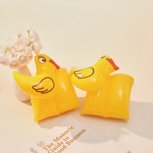 Close-up of yellow 3D duck inflatable swim arm bands made of thickened PVC material