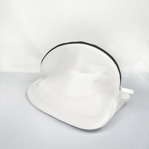 Close-up of thickened mesh laundry bag with fine texture and black zipper detail
