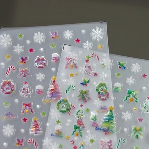 Holographic Christmas nail stickers with colorful laser snowflake and reindeer patterns