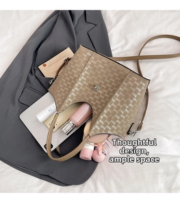 Top view of spacious khaki tote bag interior showing large capacity for everyday items