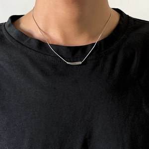 Minimalist silver curved bar pendant necklace for men featuring a sleek metal chain link