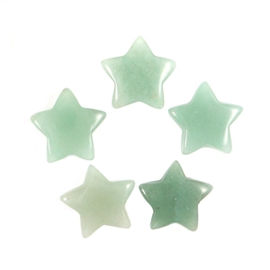 Top view of five polished light green star-shaped natural gemstones on white backdrop
