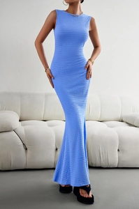 Detailed view of the blue sleeveless knit maxi dress featuring an elegant pleated texture