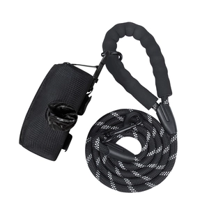 Detail of reflective dog leash with padded foam handle and waste bag dispenser with D-ring