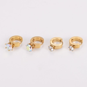 Gold hoop earrings set with iridescent and clear cubic zirconia on white background