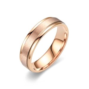 Macro view of 6mm rose gold titanium steel ring with elegant matte brushed finish