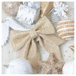 Close-up of champagne gold glitter bow ornament with luxury festive textures and sparkles