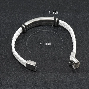 Detail view of white braided leather bracelet with silver stainless steel plate, 21cm long