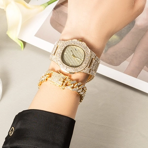 Luxury gold iced-out watch and Cuban link bracelet set for men with full diamond pavé finish