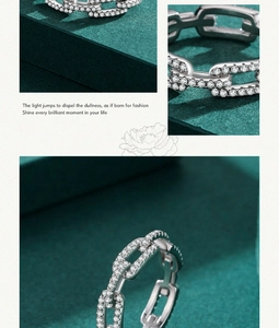 Detailed macro view of S925 sterling silver chain link ring with micro-pave white zircons