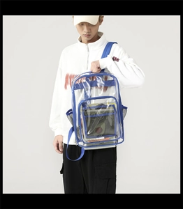 Detail view of large capacity transparent waterproof PVC backpack with blue trim and straps
