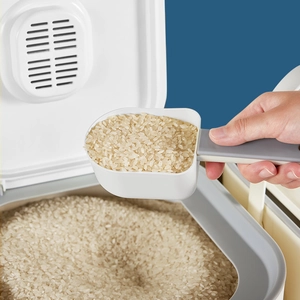 Minimalist food-grade plastic rice dispenser with measuring scoop in white and gray