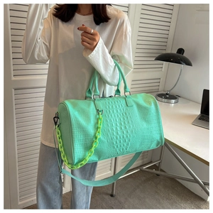 Trendy mint green crocodile pattern large capacity travel bag with neon green chain