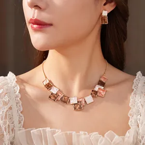 Minimalist square enamel pendant necklace and earrings set in golden geometric design