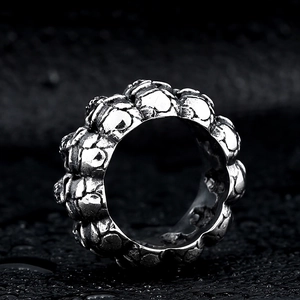Vintage stainless steel skull ring for men with punk gothic design in antique silver
