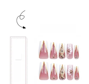 Detailed view of press-on nails featuring 3D white petals and sparkling rhinestones