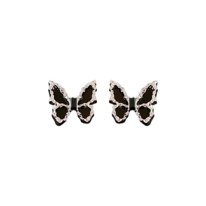 Elegant black butterfly stud earrings with sparkling diamonds on a clean white backdrop