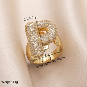 Detailed view of gold-plated letter P ring with zircons and size specifications