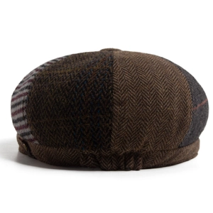 Vintage patchwork wool newsboy cap with herringbone patterns and elastic back design