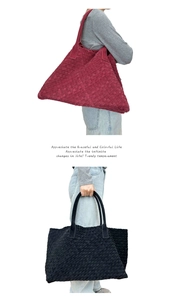 Detail of woven leather tote bag in burgundy and black with matte suede texture finish