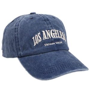 Vintage washed blue baseball cap with embroidered Los Angeles text on a white background