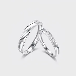 Detail view of 925 sterling silver adjustable rings for couples with small diamonds