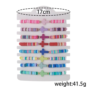 8-piece bohemian colorful clay bead cross bracelet set on a display card for beach style